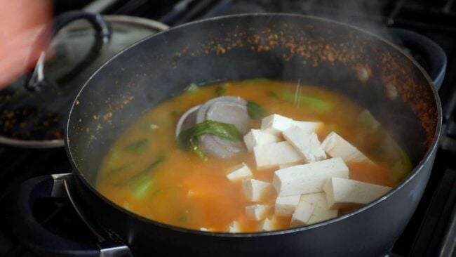 Hot and Earthy Doenjangguk Soup with Tofu and Rice